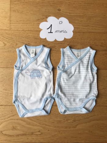 Lot 2 bodies sans manches C&A 1 mois