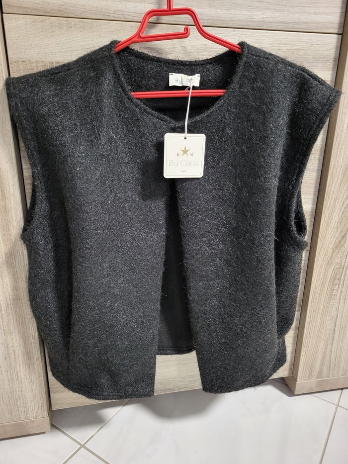 Vends gilet noir sans manche