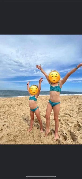 Maillot de bain 2 pièces fille 4 ans comme  neuf
