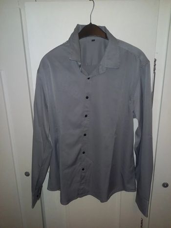 Chemise homme T.L  comme neuve