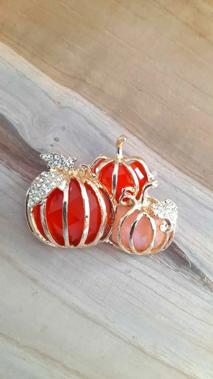 Broche citrouilles neuve