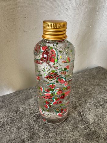 Bouteille sensorielle thème pastèque 