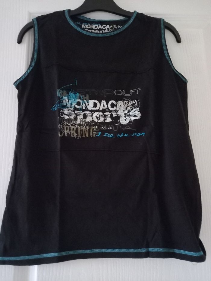 Tee-shirt sans manches noir et bleu taille 14 ans