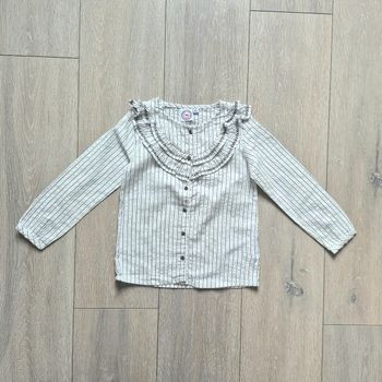 Chemise blanche, noir et argenté. Fille 5 ans. Marque La compagnie des petits