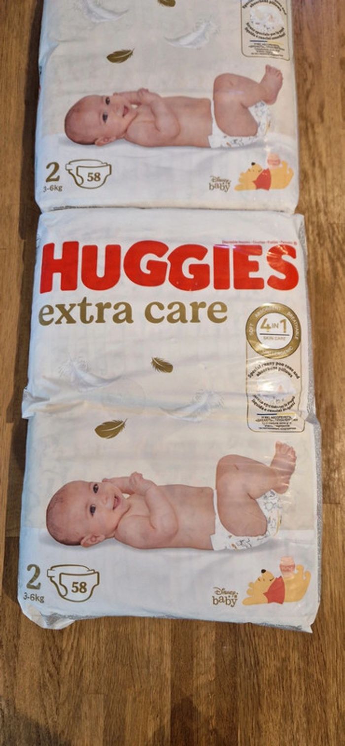 Lot de 2x58 couches taille 2 Huggies extra care neufs - photo numéro 2