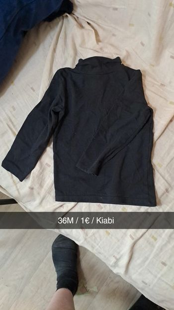 Col roulé noir à manche longue