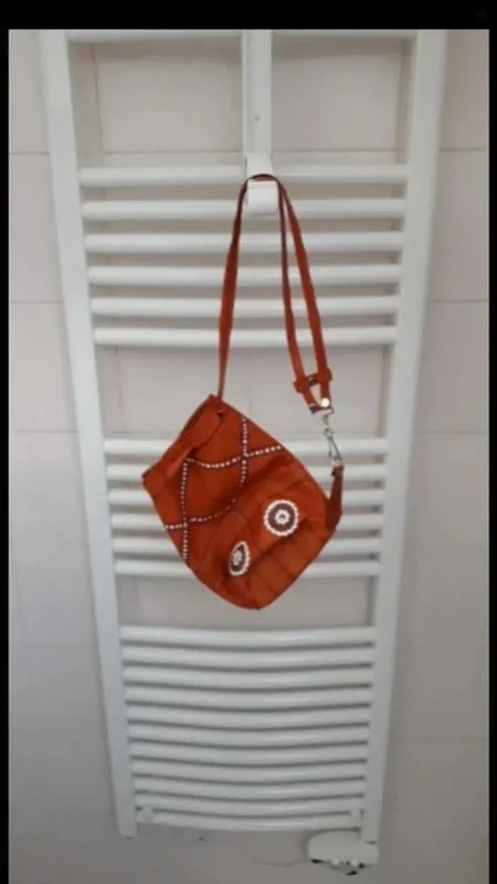 Pochette sac en cuir de chèvre