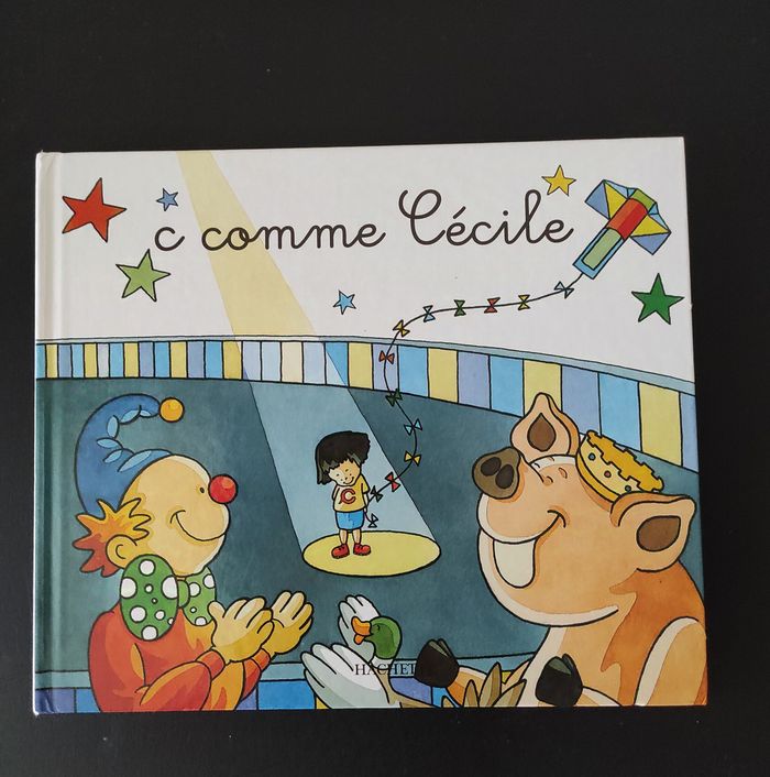 📚 Livre C comme Cécile – Très bon état (couverture réparée)