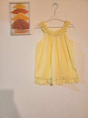 Blouse legere jaune "tape à l œil" taille 12 ans