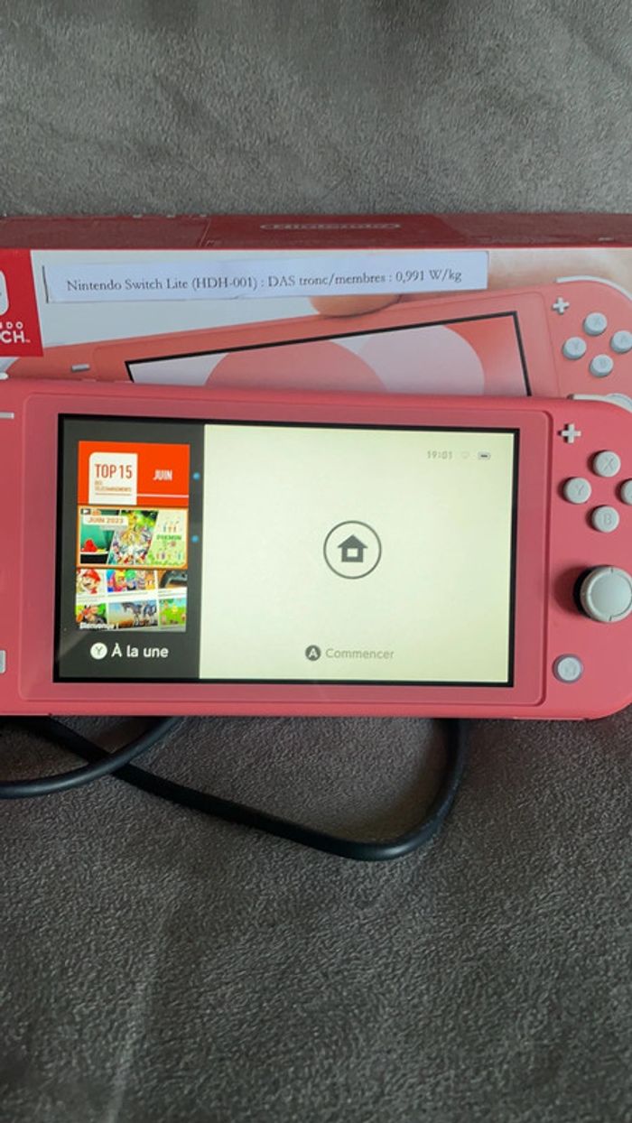 Nintendo Swtch Lite Corail état neuf - photo numéro 8