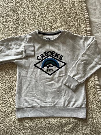 Pull gris Creeks