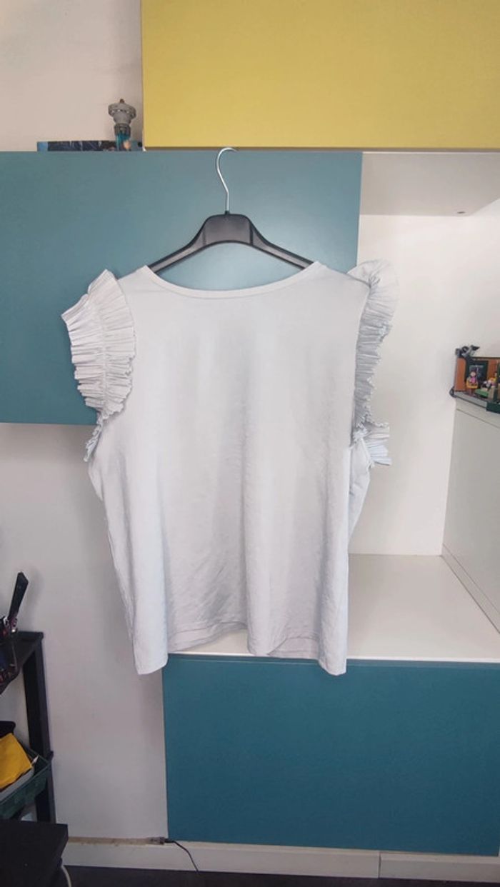 Top Zara bleu clair/gris à volants, Taille M