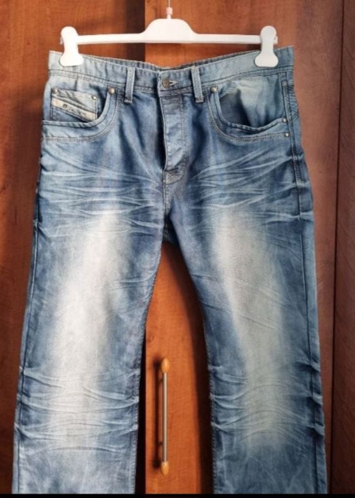 Jeans effet délavé - photo numéro 1