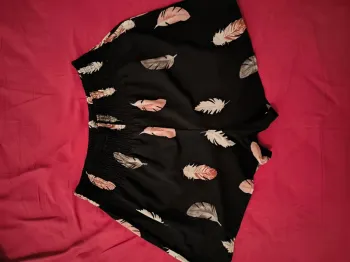 Short noir à plumes taille L