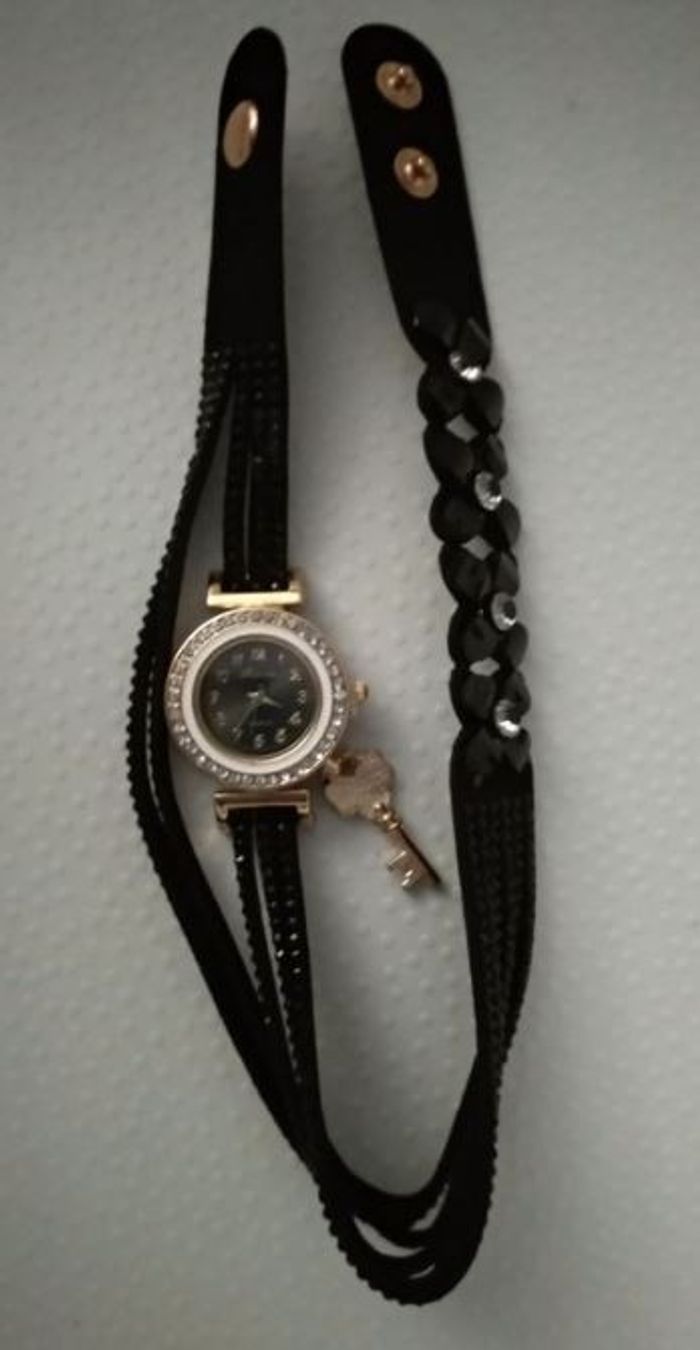Montre noire femme neuve - photo numéro 2