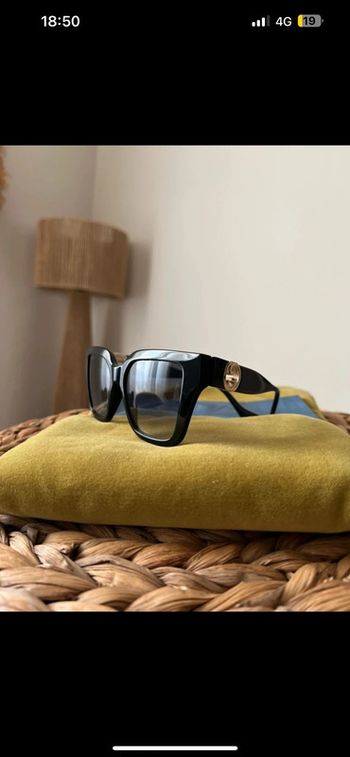 Lunettes de soleil Gucci noires - Logo doré