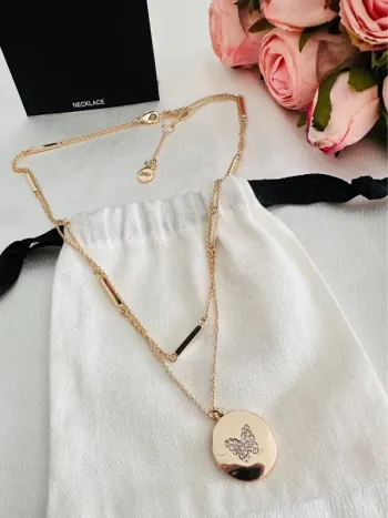 🦋Collier DKNY doré double rang médaillon papillon strass – authentique, neuf