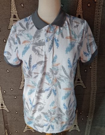 Polo blanc à motifs feuilles palmiers taille M