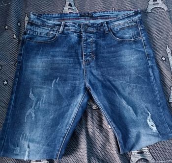 Jeans effet délavé et usé avec troués taille 48