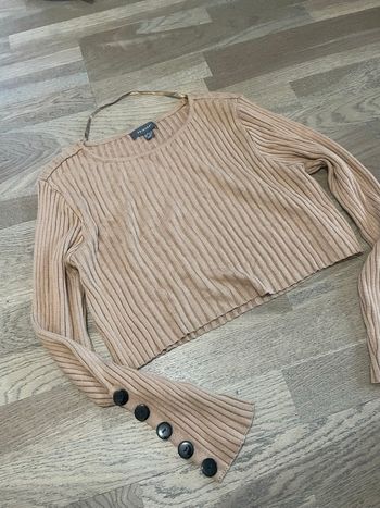 Pull court taille L très bon état