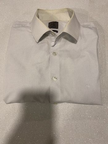 Superbe chemise blanche à motif bleu Calvin Klein taille L 40 traces au col sinon impeccable