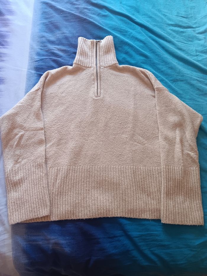 Pull col roulé