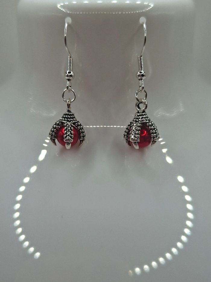 Boucle d'oreille patte de dragon - photo numéro 2