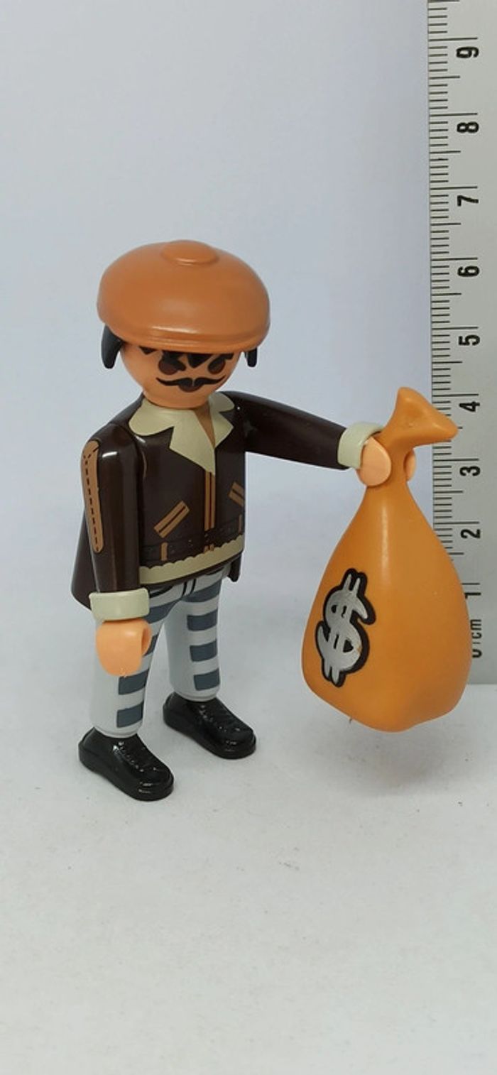 Homme voleur avec sac et pantalon à rayures playmobil