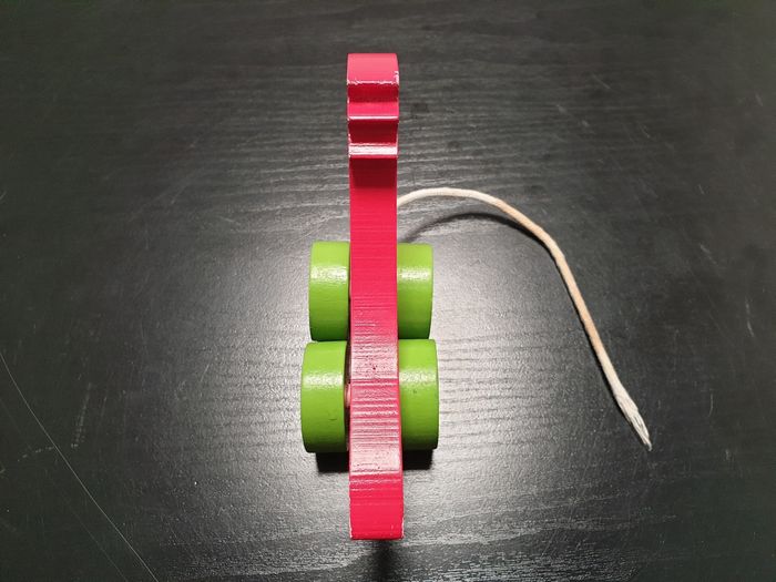 Petit perroquet en bois à roulettes - photo numéro 4