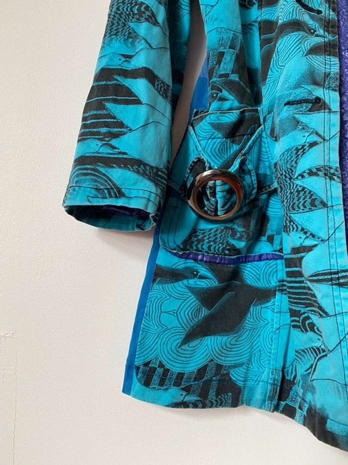 Custo bleu - photo numéro 7