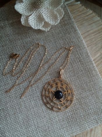 Collier obsidienne noire et médaillon étoile astro