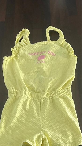 Combi short orchestra en parfait état taille 10 ans.98% coton