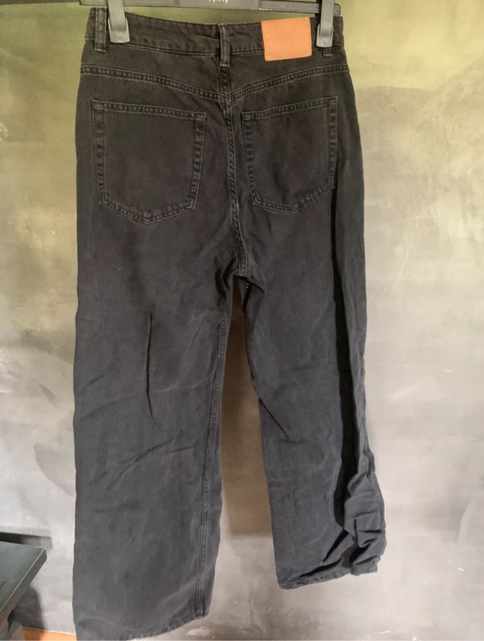 Jeans troué - photo numéro 2