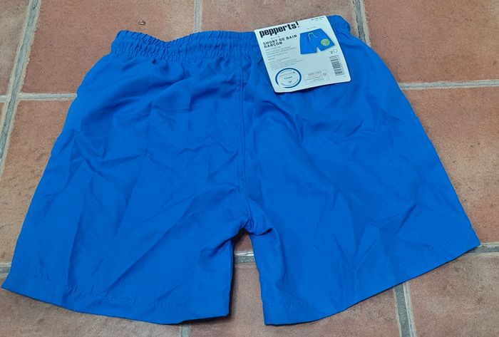 Short de bain neuf avec étiquette 8/10 ans - photo numéro 2