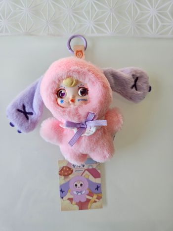 Magnifique peluche porte clés 