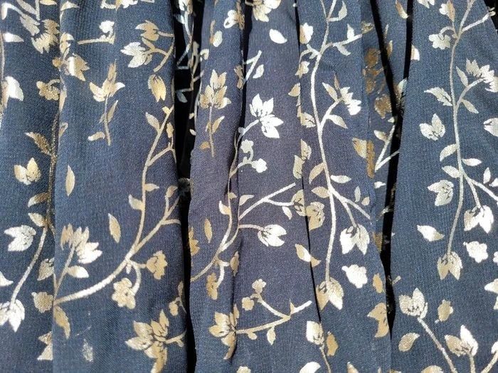 Gémo, jupe de fêtes, tulle,motifs feuilles dorées sur noire, 10 ans - photo numéro 4