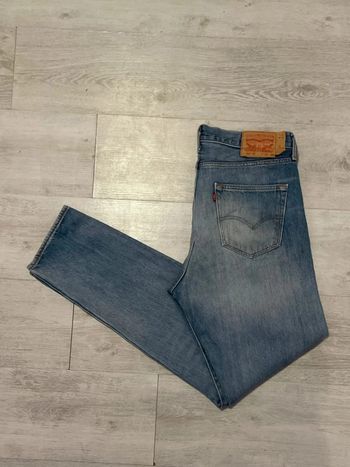Jean levi’s 501 taille W33 L34 bleu