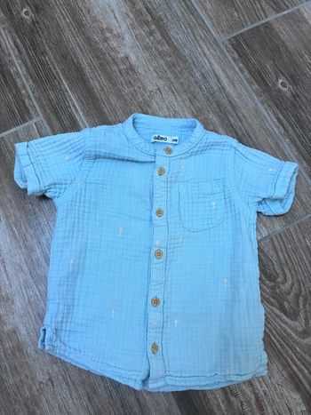 Chemise manches courtes bleu ciel avec palmiers blancs