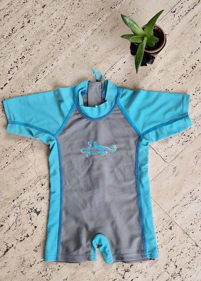 Combinaison anti-UV bébé T. 6/12 m.