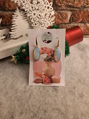 Boucles d'oreilles pendante doré et blanc translucide