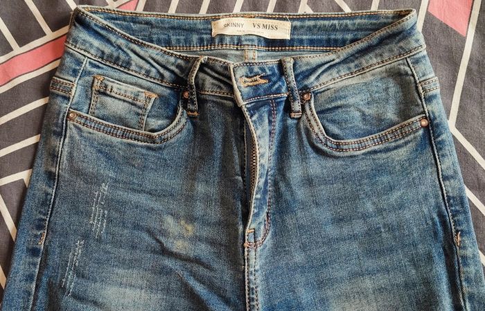 Jean troué femme - photo numéro 3