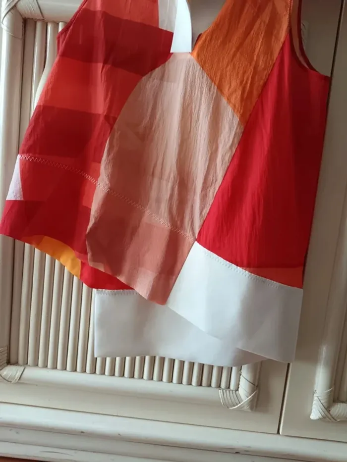 Haut Lacoste femme asymétrique t.38 - photo numéro 6