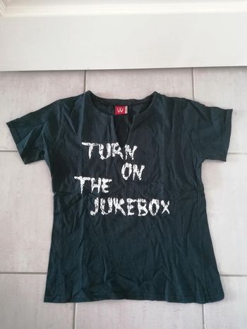 Tee-shirt très peu porté comme neuf taille 42/44