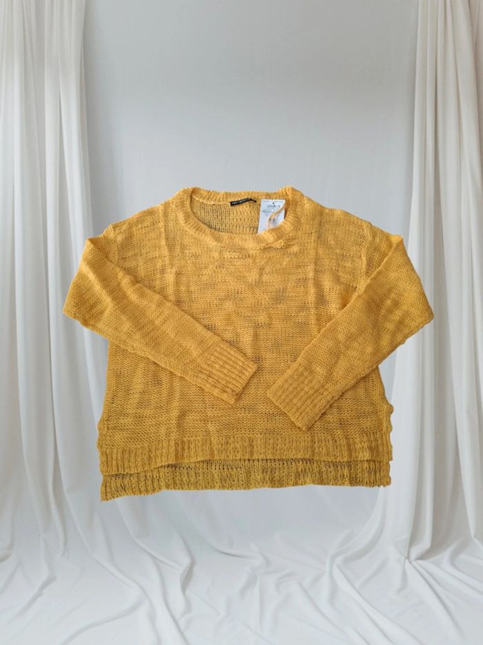 Pull troué mi-saison