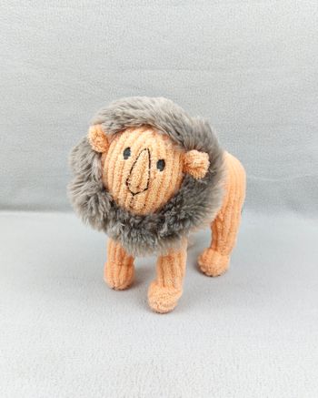 Peluche doudou lion orange HEMA 22 cm éponge fourrure gris