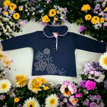 Haut marine fleurs KMG 2 ans TBE (2€)