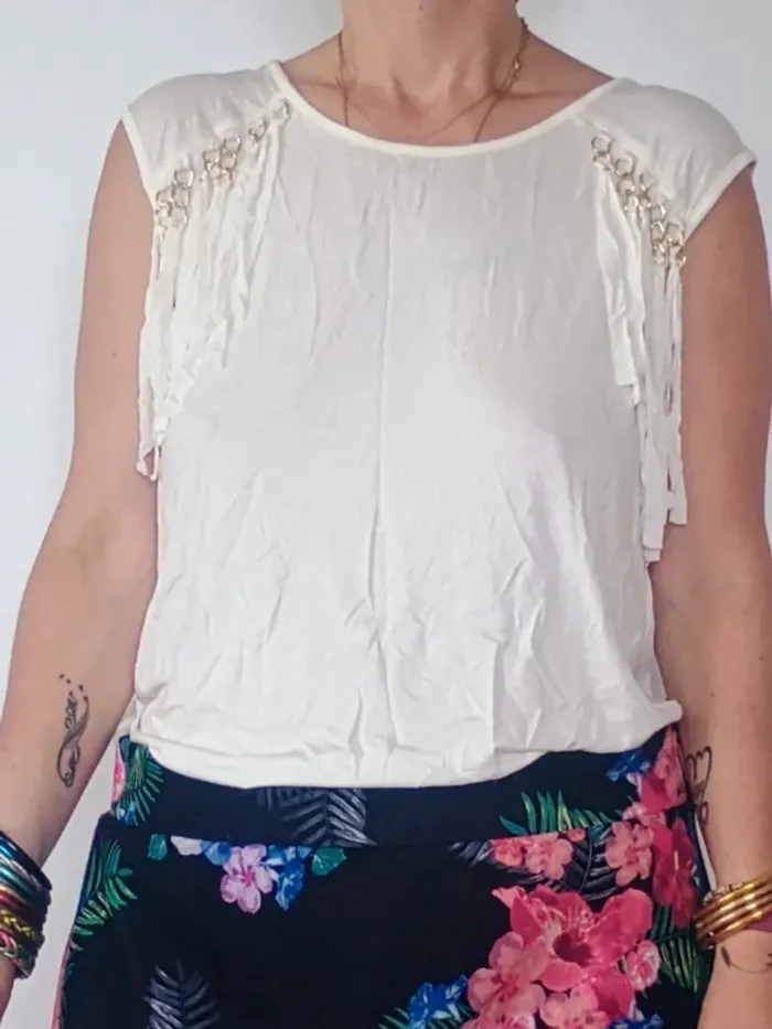 haut blanc à frange taille M/L