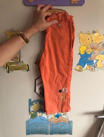 Pantacourt orange a motifs, réglable à la taille, taille 5 ans, marque Kiss Mélody.