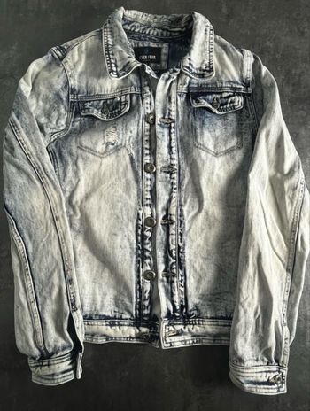 Veste en jean effet déchiré et délavé