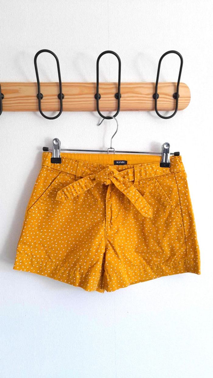 Short jaune à pois blanc Kiabi 9 ans